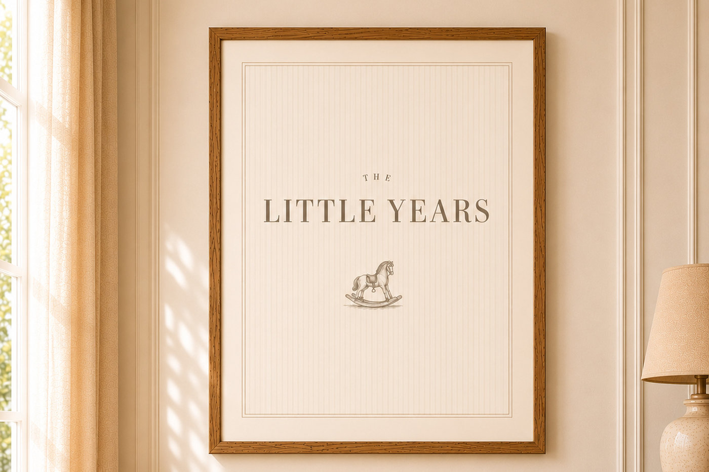 The Little Years vintage nursery printable wall art framed in vintage walnut above a refined wooden crib.